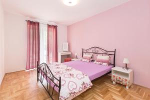 Postel nebo postele na pokoji v ubytování Apartment Aquamarine
