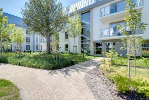 Vonkajšia záhrada v ubytovaní 3 City apartments - Syma