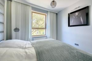 Posteľ alebo postele v izbe v ubytovaní 3 City apartments - Syma