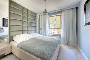 Posteľ alebo postele v izbe v ubytovaní 3 City apartments - Syma