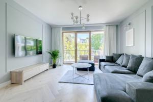 Televízia a/alebo spoločenská miestnosť v ubytovaní 3 City apartments - Syma