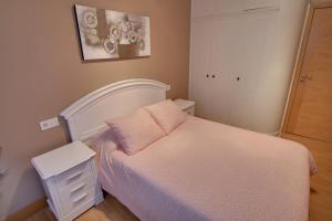 Cama o camas de una habitación en Apartamento de Evaristo