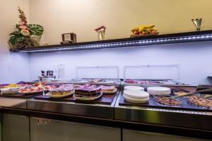 a buffet line with many different types of food at Ruby Blue in Ostrava