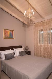 Ένα ή περισσότερα κρεβάτια σε δωμάτιο στο Stavros boutique apartments 2