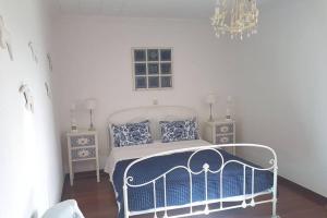 Ένα ή περισσότερα κρεβάτια σε δωμάτιο στο Casa di Sofiana by wood and stone
