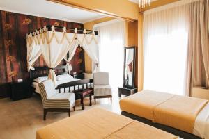 Posteľ alebo postele v izbe v ubytovaní Fanari Hotel