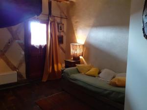 Postel nebo postele na pokoji v ubytování Chateau de Chémery
