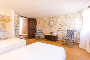 Giường trong phòng chung tại Molí D,en Barret +51 ảnh