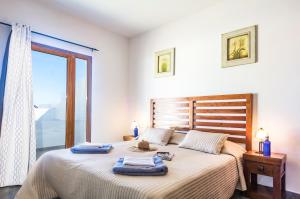 A bed or beds in a room at Villa Casa Bream Még 21 kép