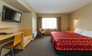 Postel nebo postele na pokoji v ubytování Brydone Hotel Oamaru