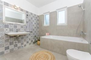 Kylpyhuone majoituspaikassa Villa Dupla Kanica