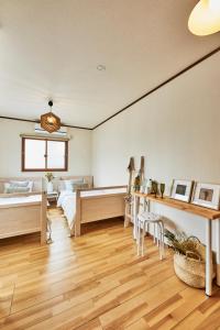 Postel nebo postele na pokoji v ubytování 今日都 Kyoto Guesthouse