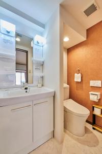 Koupelna v ubytování 今日都 Kyoto Guesthouse + 37 fotografií