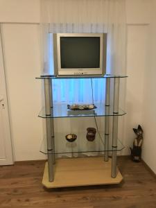 TV a/nebo společenská místnost v ubytování Nyugalom Pihenő