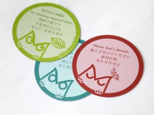 two circles with different writing on them at KOKO HOTEL Ikebukuro in Tokyo