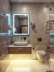 Koupelna v ubytování Viva Hotel