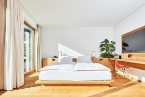Katil atau katil-katil dalam bilik di ART HOUSE Basel - Member of Design Hotels