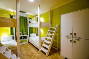 
A bunk bed or bunk beds in a room at Hostel Kyosheto
