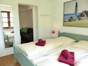 Postel nebo postele na pokoji v ubytování Schwanenhof (EG)