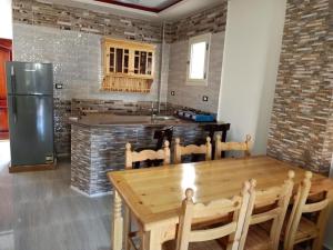 Kuchyň nebo kuchyňský kout v ubytování Badr Deluxe Apartments - Families Only