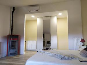 Postel nebo postele na pokoji v ubytování B&B MOLIN DEL TOPO