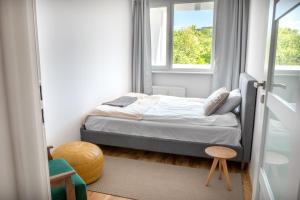 Posteľ alebo postele v izbe v ubytovaní Nest Centrum Toruń