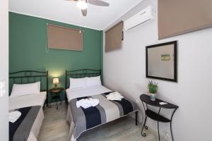 A bed or beds in a room at Villa Gerasimoula