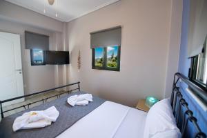 A bed or beds in a room at Villa Gerasimoula