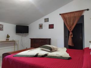 Postel nebo postele na pokoji v ubytování B&B MOLIN DEL TOPO