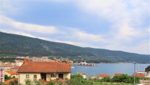 a view of a city and a body of water at Guesthouse Villa Marija in Cres