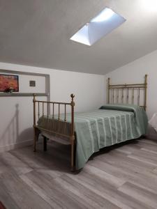 Postel nebo postele na pokoji v ubytování B&B MOLIN DEL TOPO