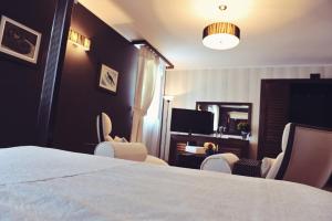 Cama o camas de una habitación en Hotel Per Astra