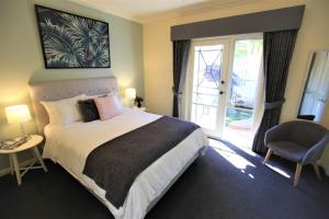 Postel nebo postele na pokoji v ubytování Healesville House - Fig Tree House