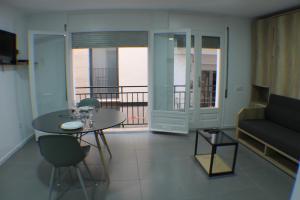 A television and/or entertainment centre at Agi Arago Studio