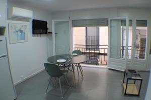 A television and/or entertainment centre at Agi Arago Studio