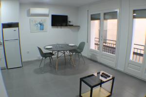 A television and/or entertainment centre at Agi Arago Studio