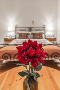 Cama o camas de una habitación en Beloi Hotel