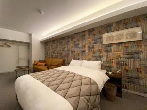 Tempat tidur dalam kamar di Randor Residential Hotel Fukuoka Classic