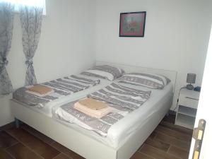 Posteľ alebo postele v izbe v ubytovaní Villa Niva