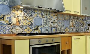 Kuchyňa alebo kuchynka v ubytovaní CASA DEL FARO PORTOPALO