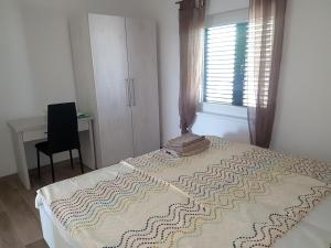 Postel nebo postele na pokoji v ubytování Villa Niva