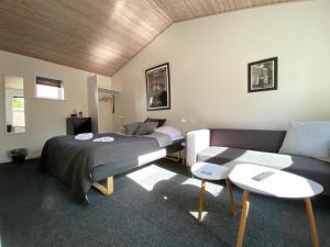 Postel nebo postele na pokoji v ubytování Skagen Motel