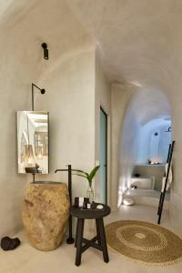 Letto o letti in una camera di Floria Suites