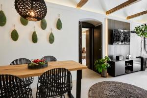 Area soggiorno di Floria Suites