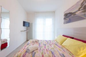 Ein Bett oder Betten in einem Zimmer der Unterkunft Enjoy, Bologna by Short Holidays