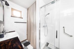 Koupelna v ubytování Rodinné apartmány Alex & Gregor + 27 fotografií