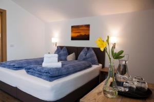 Postel nebo postele na pokoji v ubytování B&B Hotel Sonneck