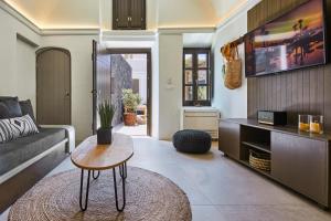 Area soggiorno di Floria Suites