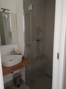 A bathroom at Athena Charming Rooms Még 37 kép