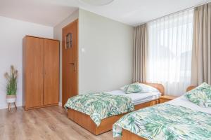 Postel nebo postele na pokoji v ubytování Paula